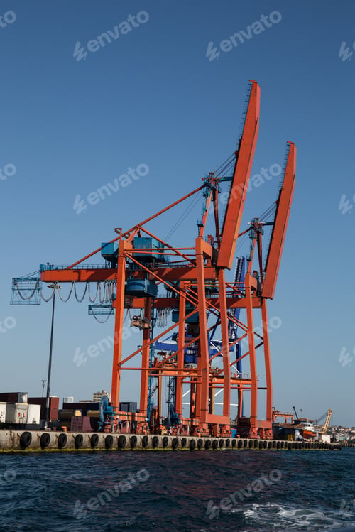 Preview: Orange Port Cranes In A Sea Port