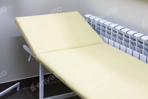 Preview: A Typical Medical Bed In A Doctors Office. Background