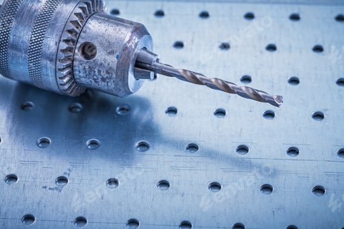 Preview: Stainless Drill On Drilled Metal Sheet Construction Concept.