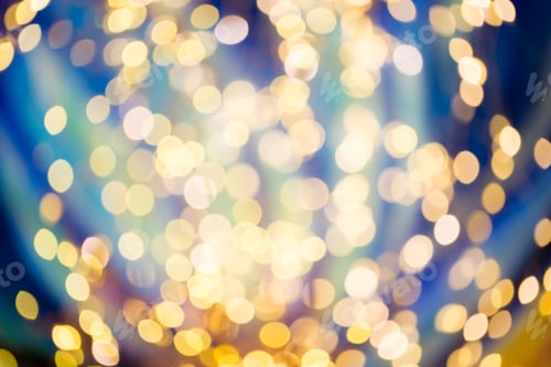 Preview: Abstract Blue And Yellow Christmas Bokeh Light Background.
