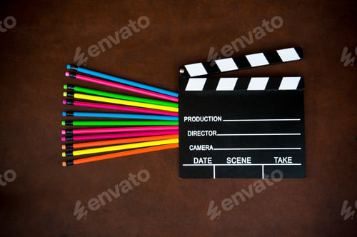 Preview: Wooden Writer Desktop With Colorful Pencil And Black Movie Clapper Board