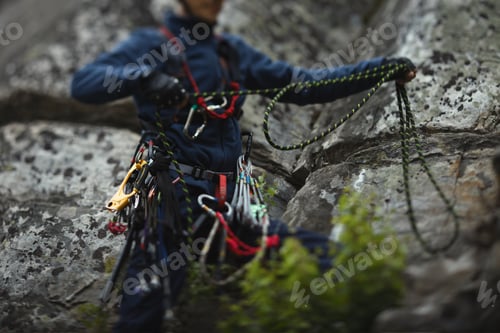 Preview: Climber Works With A Rope During The Ascent, Unsharp Silhouette, Face Is Not Visible.