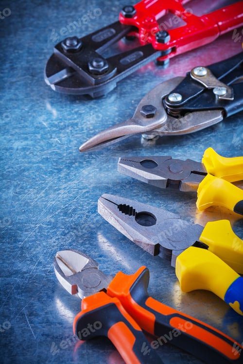 Preview: Bolt Cutter Tin Snips Gripping Tongs Nippers On Scratched Vintage Metallic Background Construction
