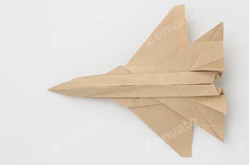 Preview: Origami Paper Airplane Mockup. Selective Focus. Light Background