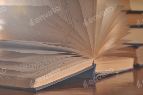 Preview: An Open Book On A Dark Background