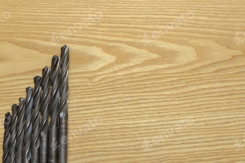 Preview: Drill Bits On Wooden Background
