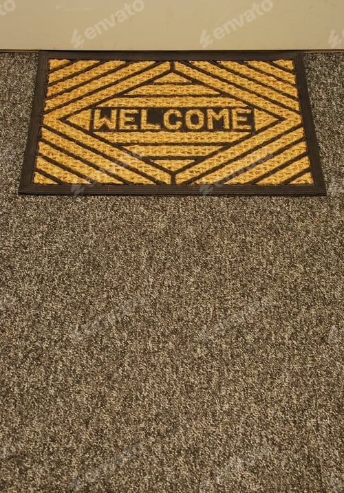 Preview: Beautiful Welcome Home Door Mat On A Grey Carpet