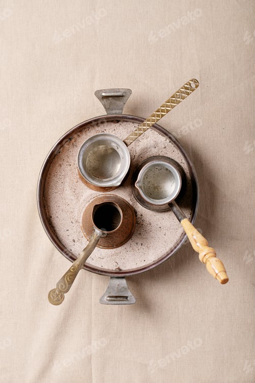 Preview: Fresh Coffee Beans In Glass Jar Over Textile Cloth Brown Background. Top View, Flat Lay