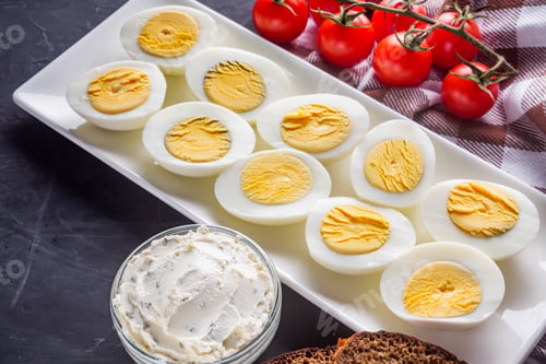 Preview: Boiled Chicken Eggs On A Dark Stone Background