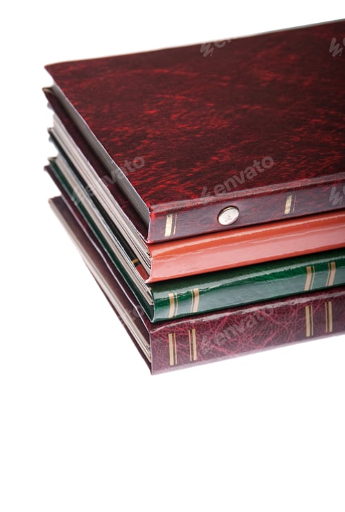 Preview: Pile Of Antique Photo Albums Isolated On White Background