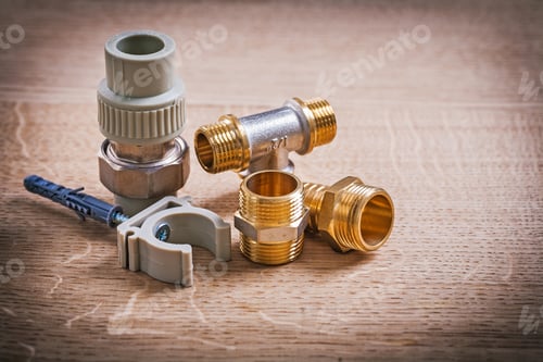 Preview: Fixators And Connectors For Water Pipies On Wooden Board