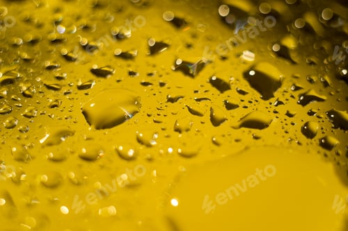 Preview: Yellow Cooking Oil Bubble And Drops On Water For Background.