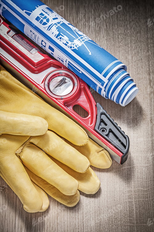 Preview: Safety Leather Gloves Construction Level Drawings On Wood Board.
