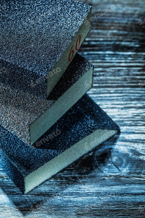 Preview: Sanding Pads On Vintage Wooden Board.