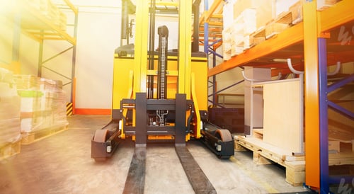 Preview: Forklift, Shelves And Racks With Pallets In Distribution Warehouse Interior