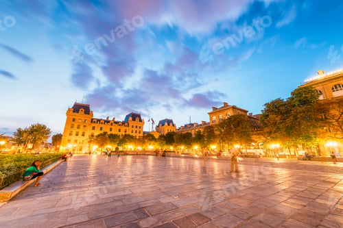 Preview: Square In Front Of Notre Dame With Tourists At Night, Paris.