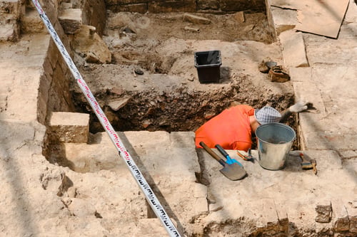 Preview: An Archaeologist Is Excavating An Ancient Building. Archaeological Work On The Excavation Of