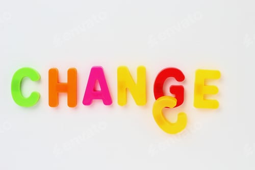Preview: Text Chance Or Change Made By Magnetic Letters On A White Wooden Background. Business Success