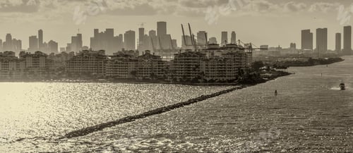Preview: Miami Silhouette Skyline Against The Sun.