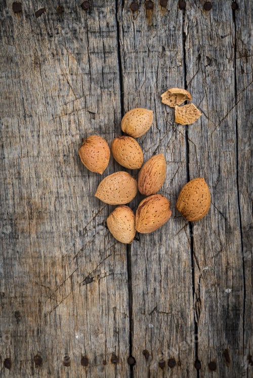 Preview: Fresh Raw Almonds On A Wooden Background