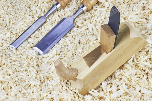 Preview: Two Chisels And One Spokeshave Lying In Wooden Shavings