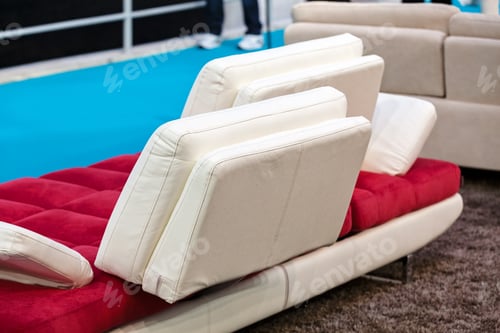Preview: Red Couch With Four Wight Rectangle Pillows; Note Shallow Depth Of Field