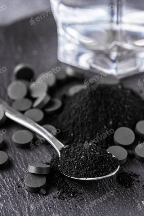 Preview: Activated Carbon On A Dark Stone Background