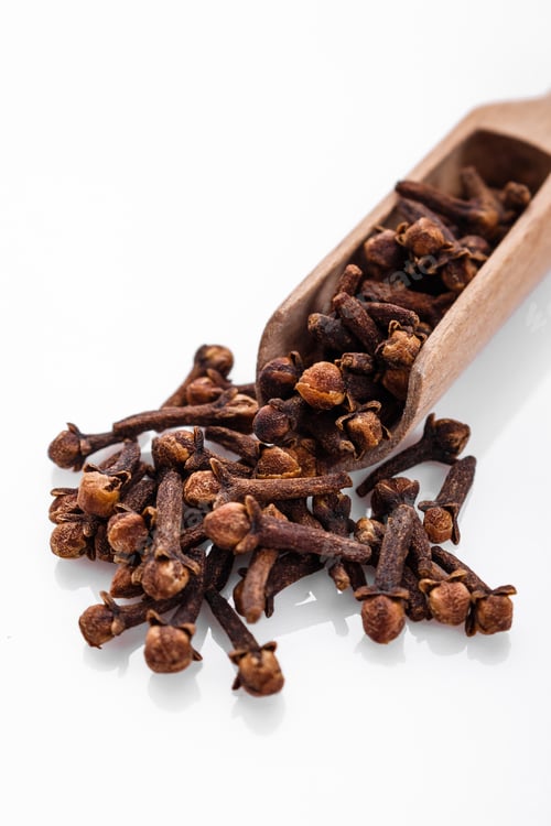 Preview: Fragrant Cloves On A White Acrylic Background