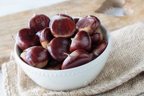 Preview: Bunch Of Fresh Raw Chestnuts In Autumn Season