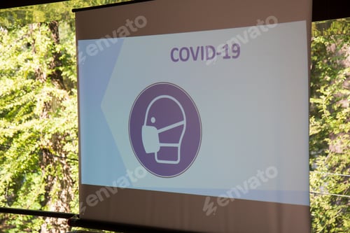 Preview: Hazard Warning Screen With Covid-19 Inscription. Abstract Background With Selective Focus