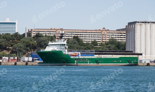 Preview: Ship In Front Of A Port Silo