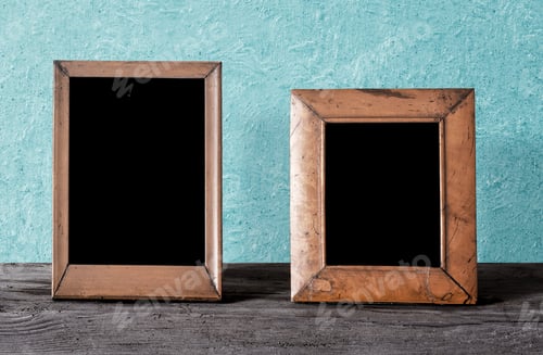Preview: Wooden Photo Frames On Table, Blue Wall