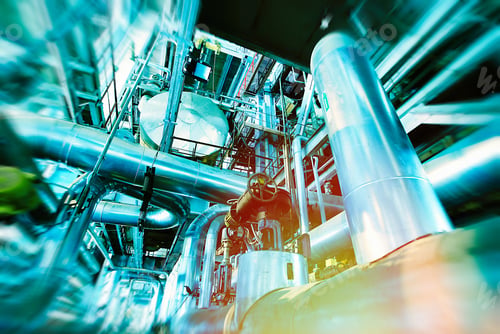 Preview: Industrial Factory. Various Mechanisms And Metal Pipes. Toned Image. Motion Blur Effect.