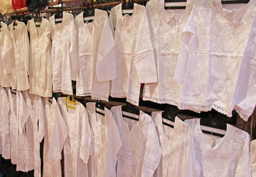 Preview: White Cotton Shirts With Embroidery Hang On Hangers And Are Sold At The Market Bazaar In India