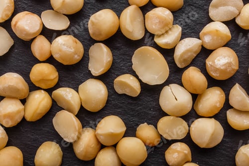 Preview: Delicious Macadamia Nuts On A Dark Stone Background