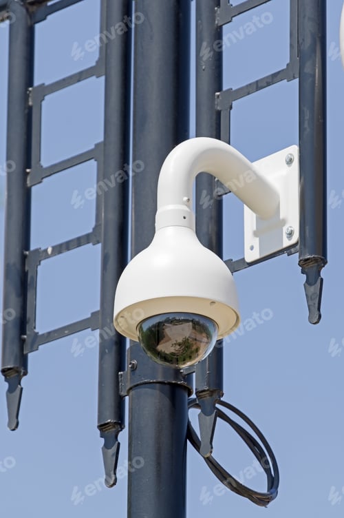 Preview: Cctv Camera Isolated On The Lamp Post
