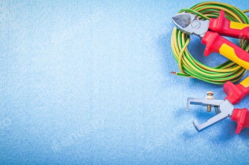 Preview: Wire Stripper Pliers Electric Cable Nippers On Blue Background Electricity Concept.