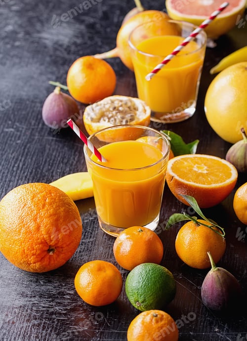 Preview: Variety Of Citrus Tropical Fruit With A Glass Of Orange Juice With A Paper Straw: Tangerines