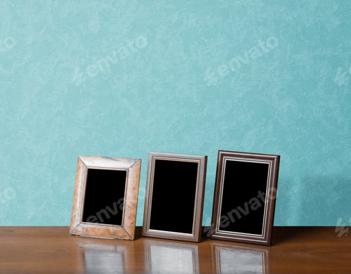 Preview: Wooden Photo Frames On Table, Blue Wall