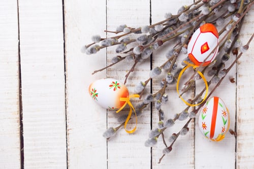 Preview: Decorative Easter Eggs And Willow Branches On Wooden Background. Easter Background For Design