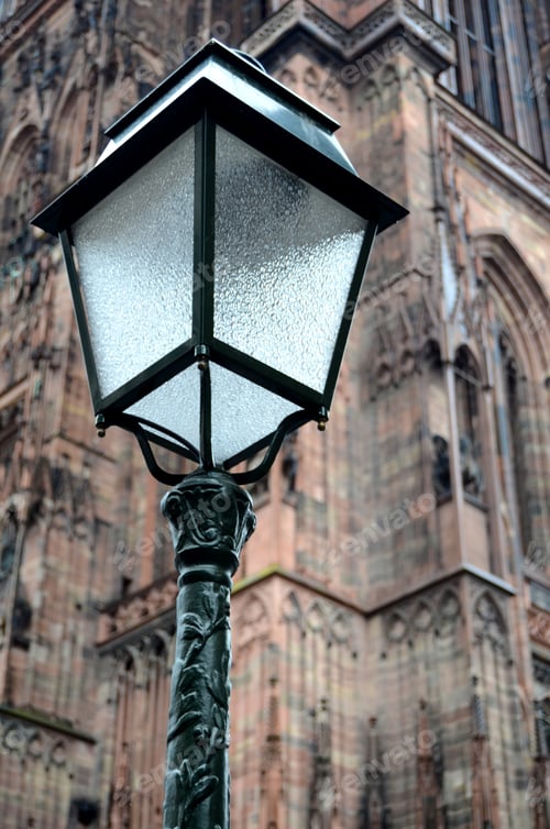 Preview: Old Street Lamp With Notre Dame In Strasbourg In The Background, France