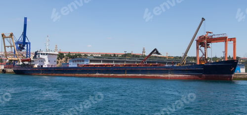 Preview: Cargo Ship Is Waiting In A Port