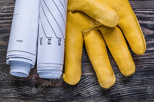 Preview: Composition Of Leather Safety Gloves Rolled Engineering Drawings On Wooden Board Construction