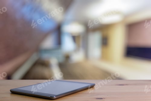 Preview: Tablet On Wooden Table In The Bedroom