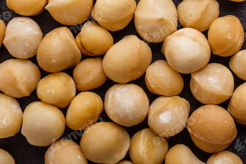 Preview: Delicious Macadamia Nuts On A Dark Stone Background
