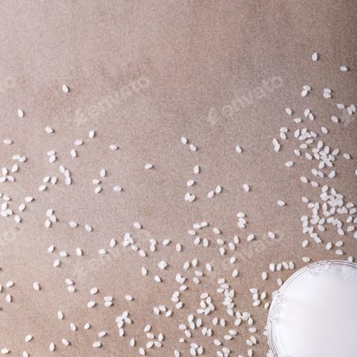 Preview: Rice Milk Served With Rice Over Brown Texture Background. Top View, Flat Lay. Copy Space. Square