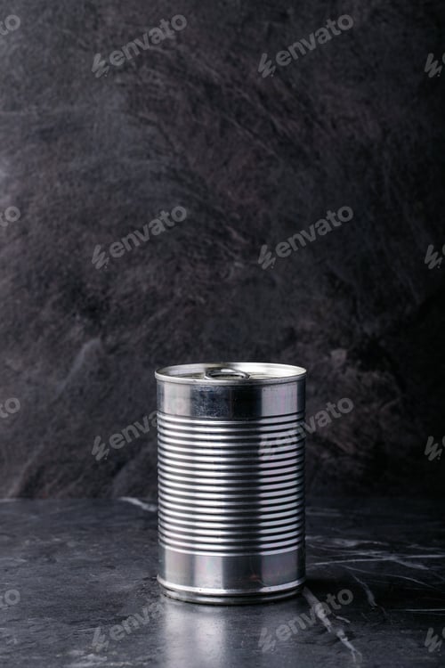 Preview: Canned Food In Metal Cans Over Dark Texture Background. Copy Space. Food Supply Concept