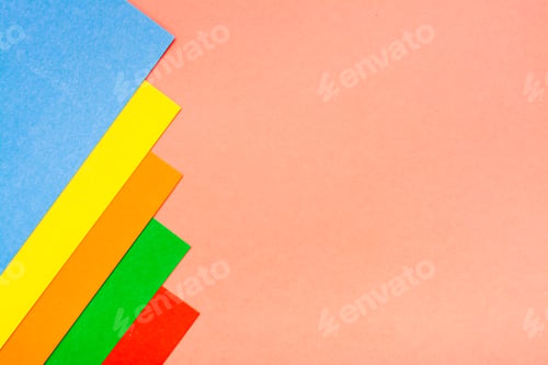 Preview: Sheets Of Colored Cardboard Lie In A Row On A Red Background. Top View. Copy Space