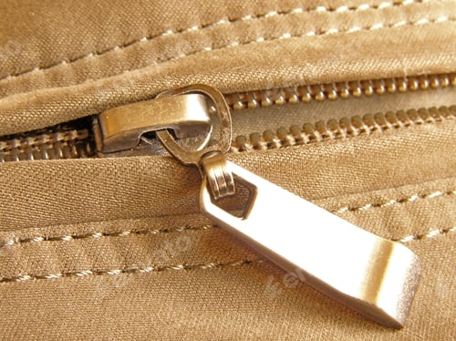 Preview: On Half Unfastened Metallic Zipper Close-Up