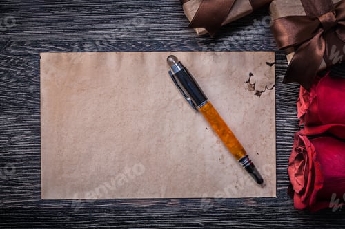 Preview: Vintage Paper Red Roses Giftboxes Fountain Pen On Wooden Board.